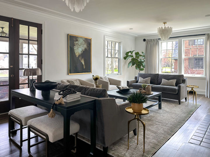 modern contemporary family room design with abtract art and gold accents. 