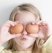 Girl Holding Eggs