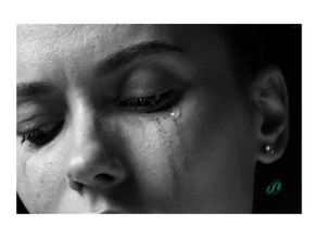 woman stressed, overwhelmed, tears on face, dark moody, energy healing 