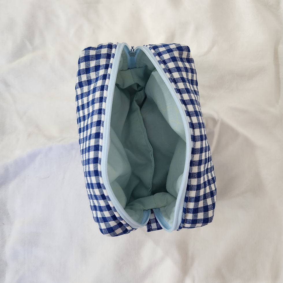 Thumbnail: Small blue checkered makeup bag