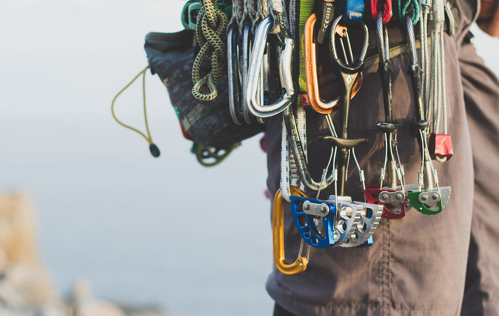 Person with Trad gear on their belt.