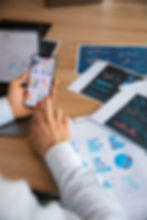 office-workers-using-finance-graphs.jpg