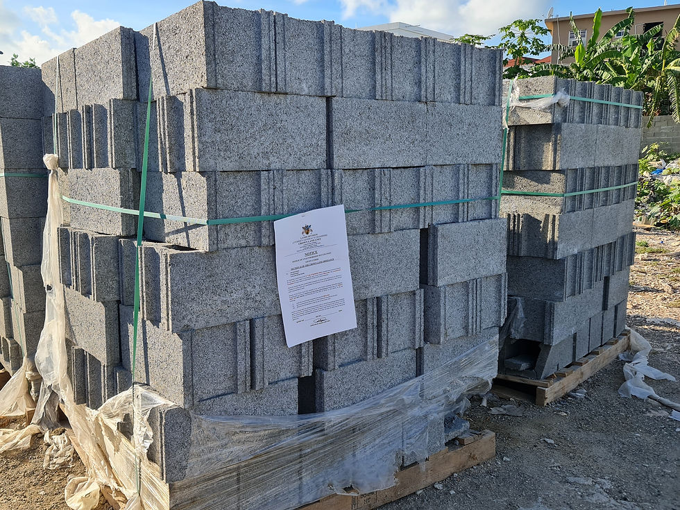Photo of aNotice of Unauthorised Occupation is seen posted on building materials