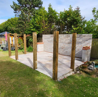 Supporting posts now levelled and concreted in, ready for roofing frame to be built on this outdoor kitchen in Birkdale.