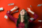 Attractive woman with falling dollars