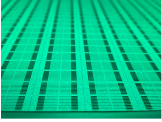 Advancements in laser patterning of sputtered coatings for high-volume production of flexible microelectronic devices