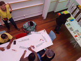 people working in a colorful space