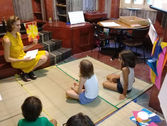 Teacher and students reading the poem.