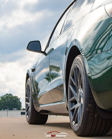 Tesla Model 3 wrapped in Inozetek Midnight Metallic Green