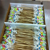 Bulk Hanukkah dreidel cookie pops individually wrapped on sticks and packed in boxes for holiday events