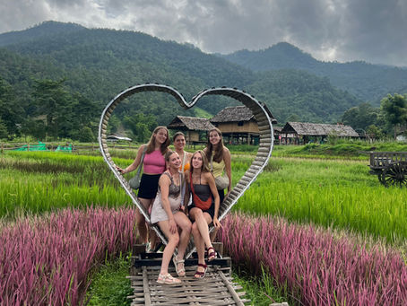 backpackers enjoying rainy season nature