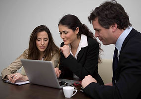 Group looking at laptop