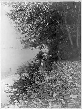 Indian woman by the river.jpg