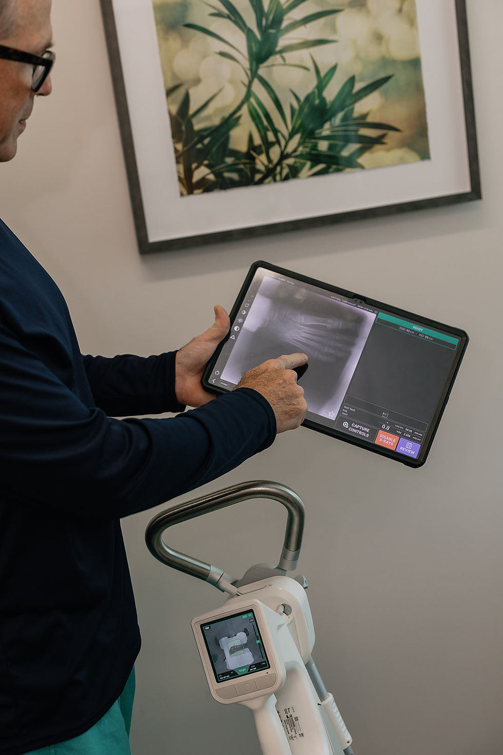Dr. Robert Santrock working with patient