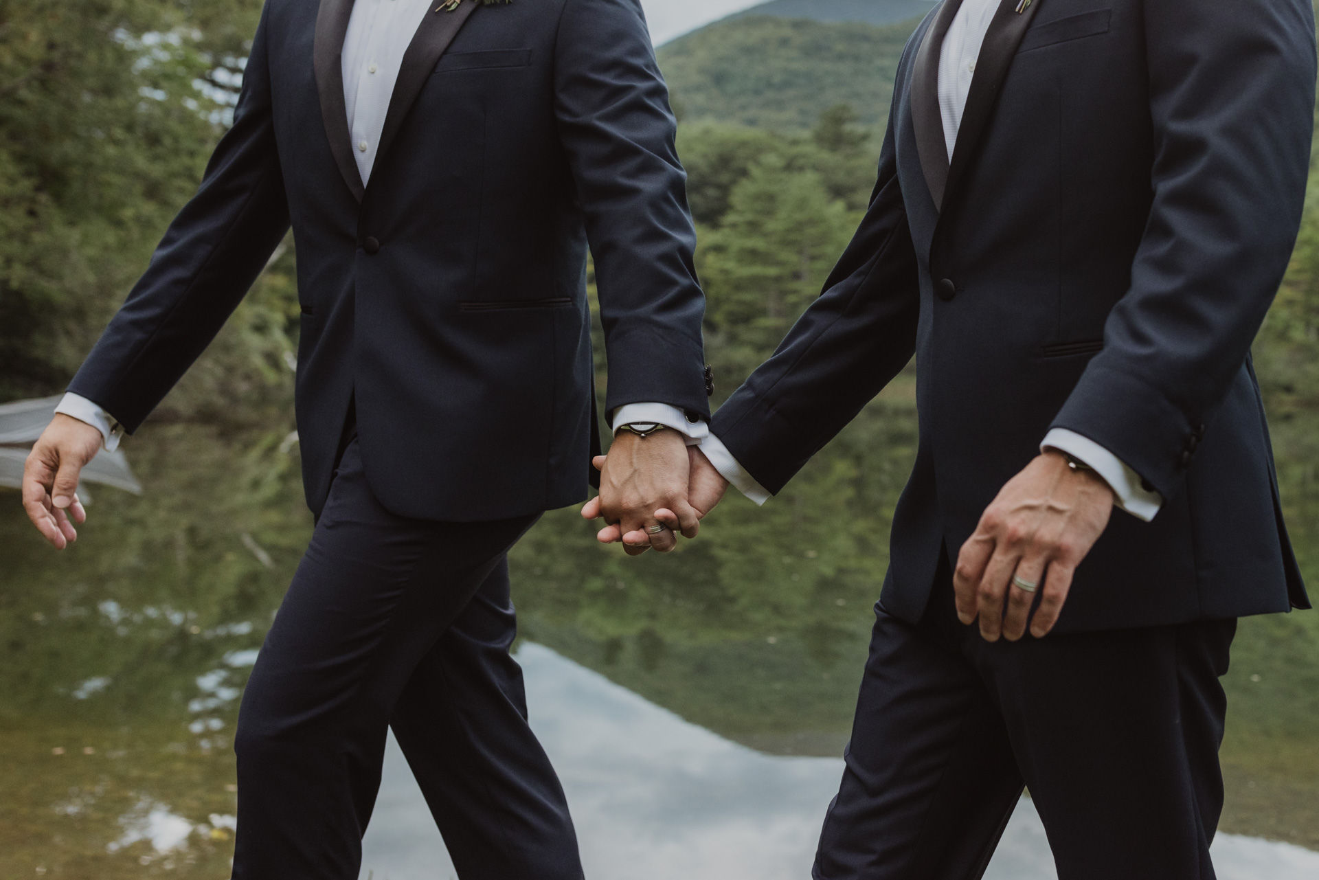 portrait of gay couple at Equinox Vermont hotel wedding