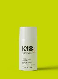 K18 Leave-In Molecular Repair Hair Mask standing against a bright green background. Included in the DCHAN SALON blog post