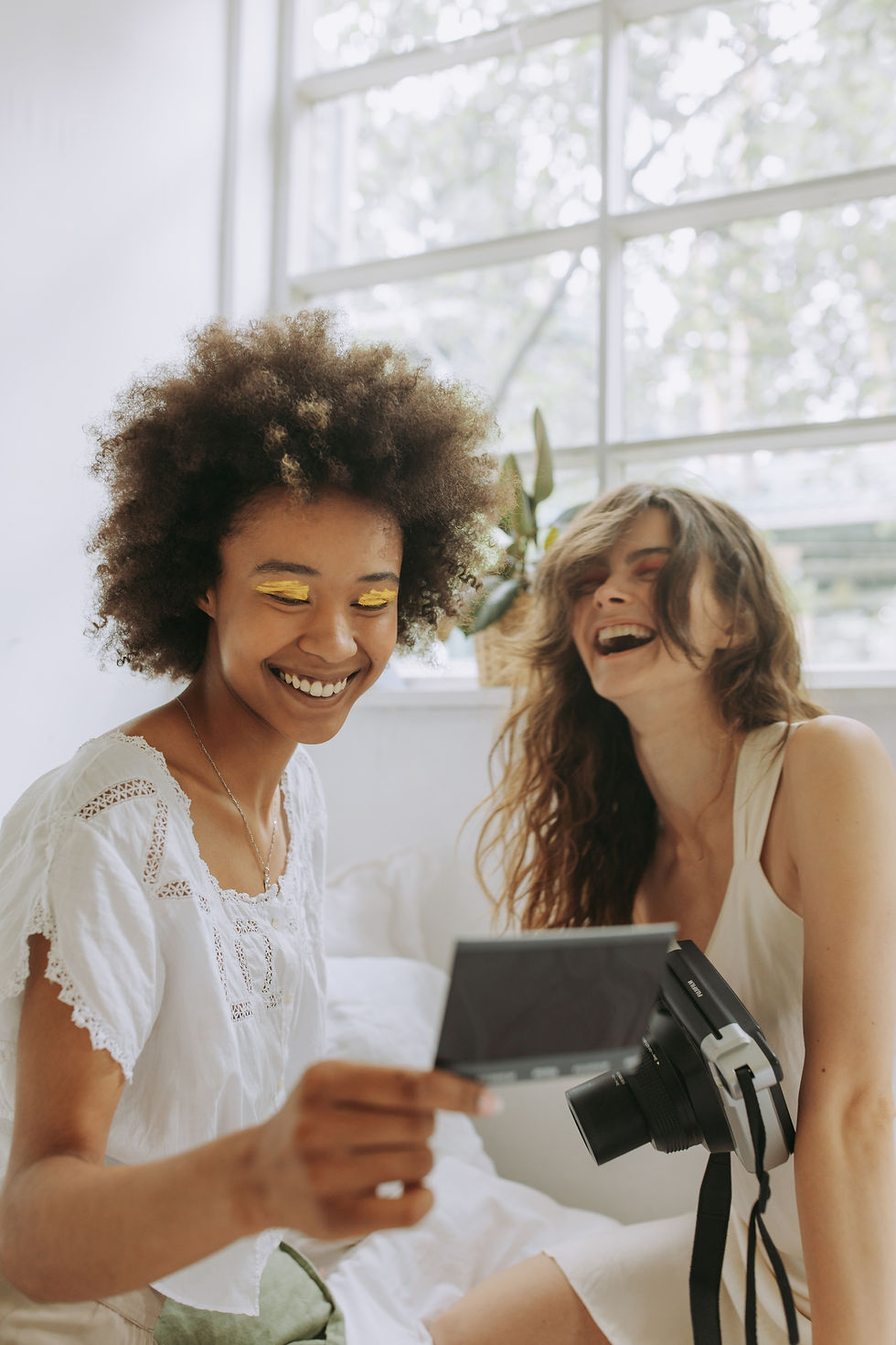 two girls laughing for 7 Ways To Achieve Happiness Using Biblical Text article