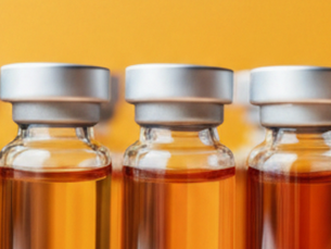 clear vials with orange background