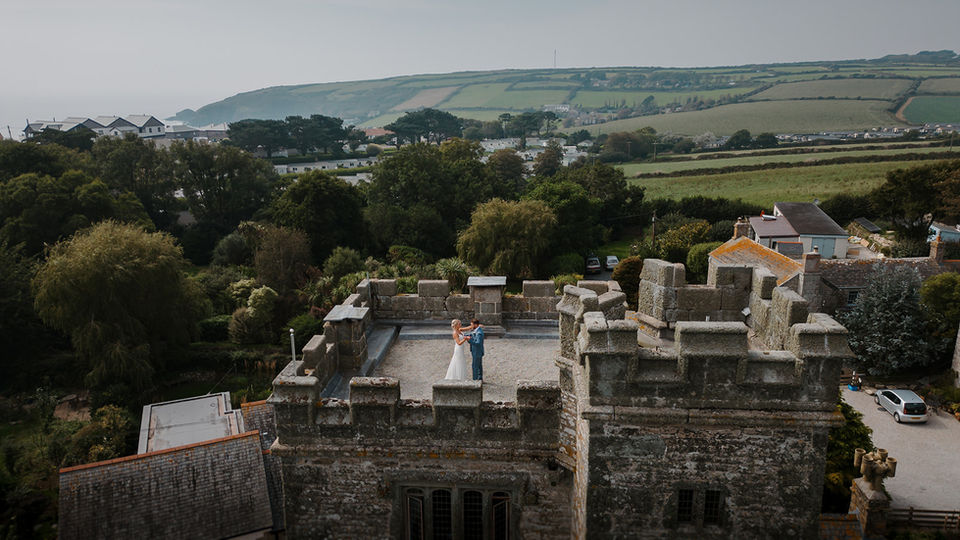 BoHo Cornwall Elopements couple on the stunning rooftop of Pengersick Castle, Praa Sands, Cornwall, UK