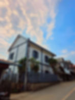 Two-story house for rent Luang Prabang under a blue sky