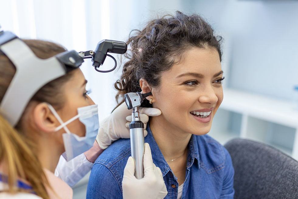 Ear consultation and examination taking place. This is usually the first step to determine if ear wax is the primary cause for hearing loss