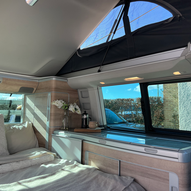 Van interior with pop top open