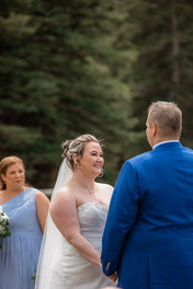 bride smiling at groom