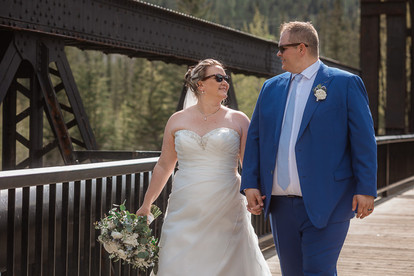Bride and groom photos at canmore train bride