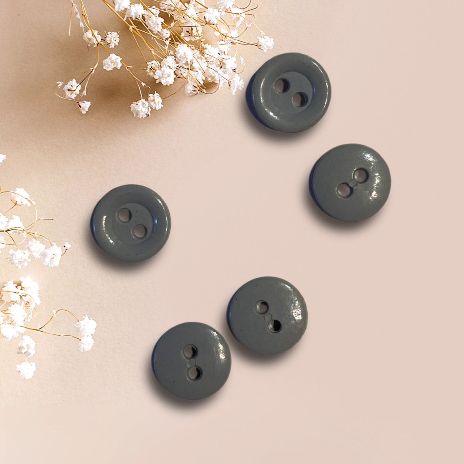 Buttons: Round 2 holes, pale blue, plastic