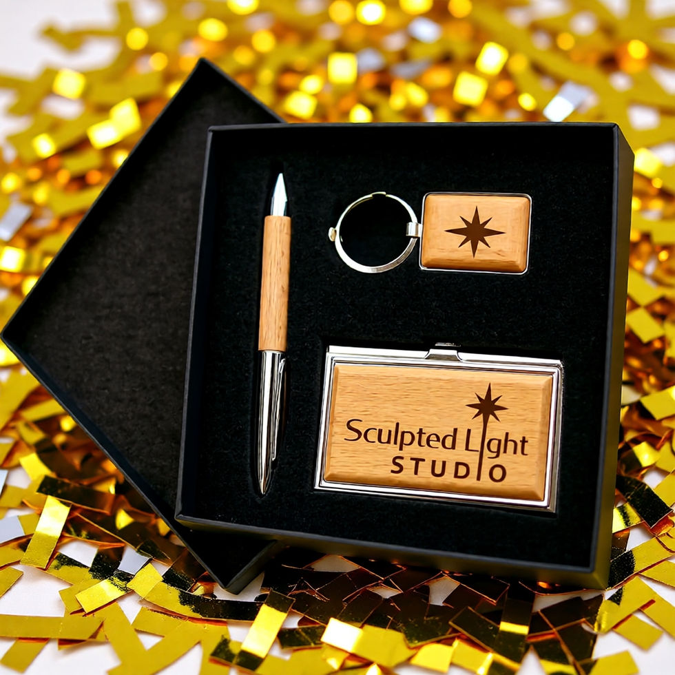 Custom engraved executive wood and silver gift set with card case, pen, and keychain in a box.