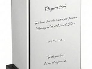 A stunning client-provided silver Milestone Keepsake Bank, custom engraved in our studio to transform a major life event into a timeless artisan heirloom.