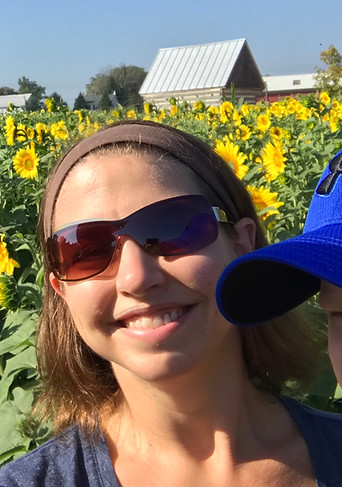 woman in sunflower field