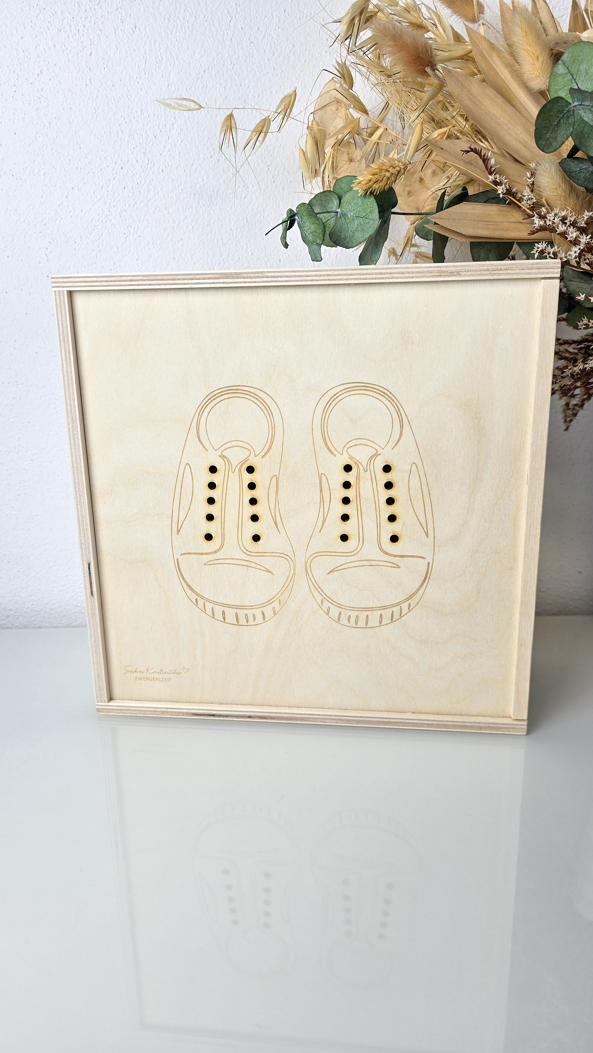 Aktivitätsplatte Schuhe binden