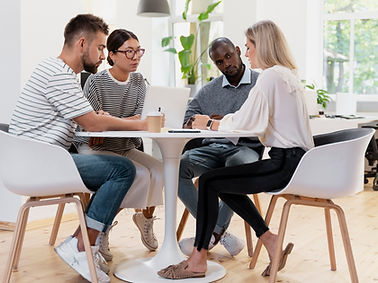 close-up-young-colleagues-having-meeting.jpg