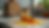 Eye-level view of a vibrant turmeric spice jar on a kitchen counter