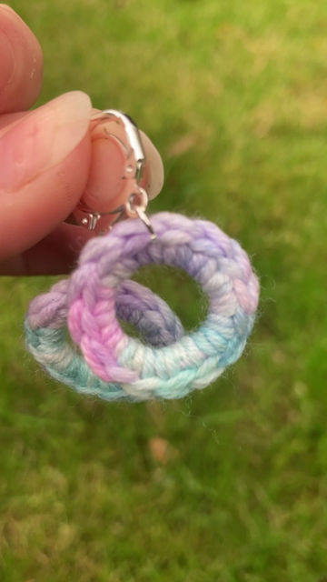 Thumbnail: The yarn has been hand crocheted onto silver plated ring bases