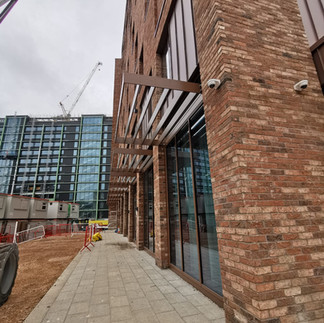 solar shading, brise soleil, facade, canopy, screens, rectangular fins, PPC, powder coated, bronze, horizontal blind, horizontal fin, fixed to curtain walling, projecting solar shading