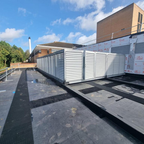 Louvre screens, weather louvres, louvres, screening, facades, doors, gates, plantscreen, natural ventilation, wall vent, healthcare, metal, aluminium, ppc, polyester powder coated, construction industry, design, architecture design, manufacturing, installation, building