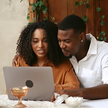 Couple in therapy session on laptop
