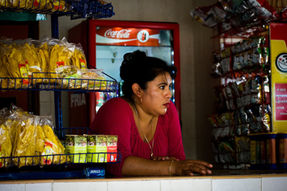 Lady patiently waiting for costumer