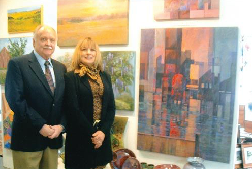 Local Art Teacher Lance Balderson, with William Ris Gallery art director Mary S. Cantone