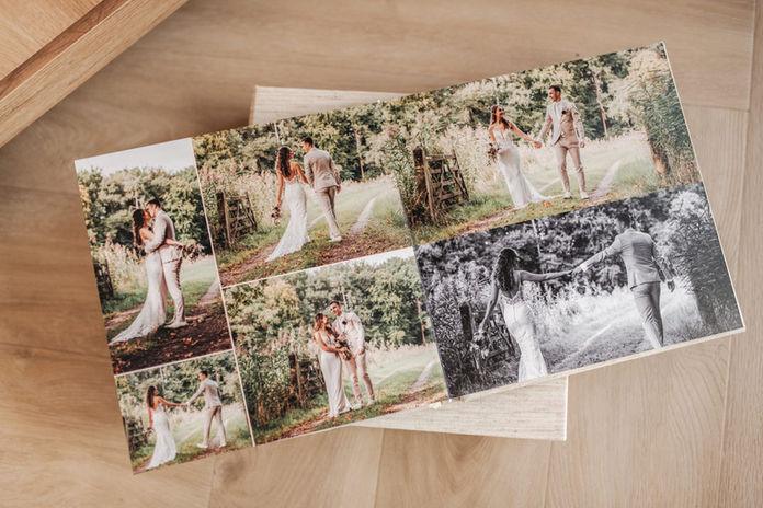 Trouwfotograaf met trouwalbum