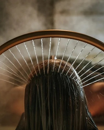 Client receiving a Japanese scalp massage at The Cleveland Headspa in Tremont, Ohio.