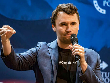 charlie kirk speaking at an event