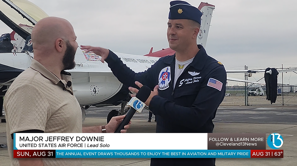 Matt Greminger (Gremi) with Major Jeff Downie of the Thunderbirds in front of Jet No 5