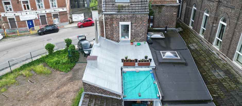 Chantier terminé à Seraing : rénovation d’une toiture plate (roofing) avec résine élastomère armée UV-Reflect
