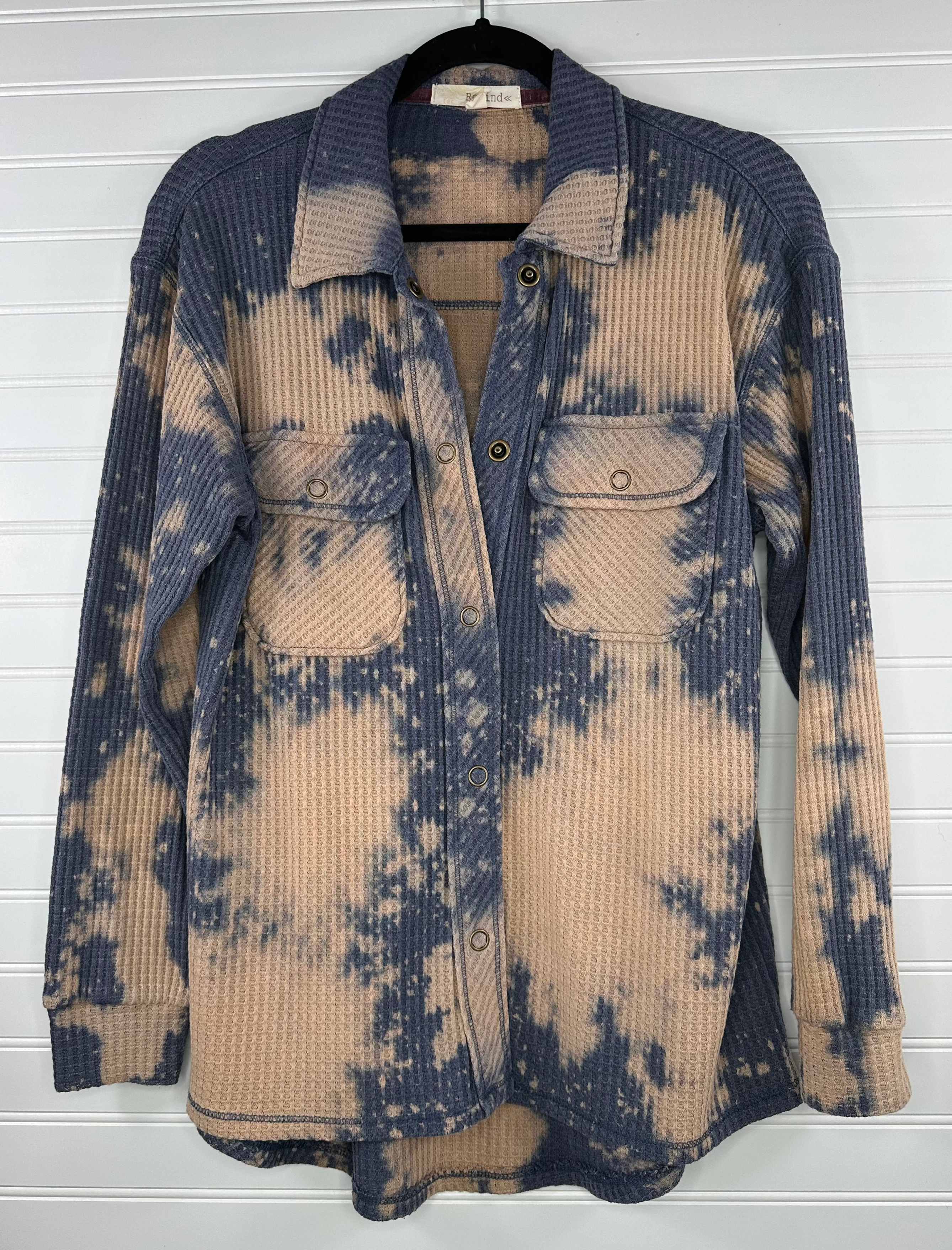 Waffle texture button up shirt in a blueish purple color and cream bleach splatter 