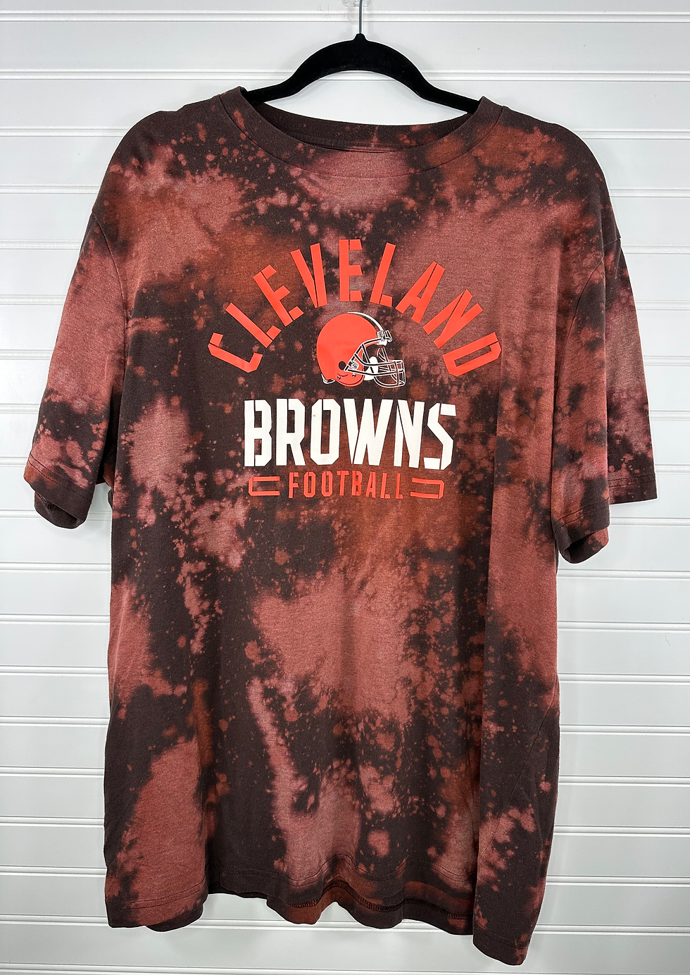 Cleveland Browns Football with helmet graphic on a brown t-shirt with bleach splatter 