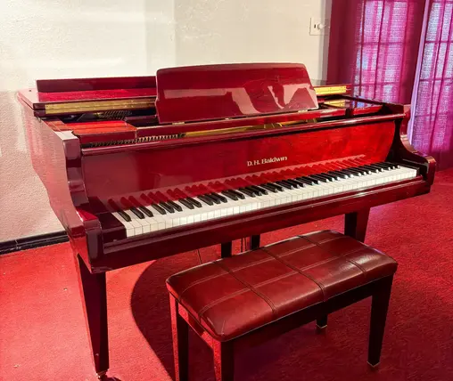 D.H. Baldwin grand piano music rack red finish at Rockafellow Piano San Antonio Texas