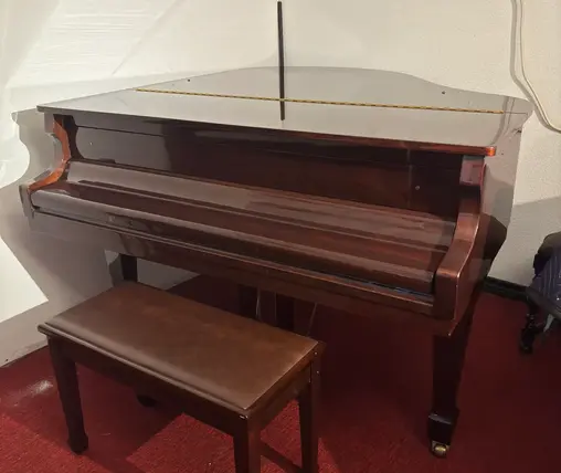 Kohler and Campbell baby grand piano closed view brown wood grain Rockafellow Piano San Antonio Texas